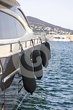 Bullbar for ship in black on a luxury yacht in marina of Saint Tropez on Cote d'Azur, French Riviera