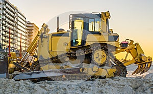 Bulldozer at the beach, ground moving equipment, heavy machinery, groundwork industry