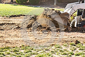 Bulldozer Breaking Ground Preparing For Pool