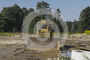 Bulldozer at building construction site