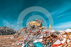 Bulldozer compactor working at a landfill
