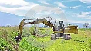 Bulldozer digging land