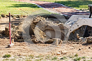 Bulldozer Digging Up Yard For Pool Installation