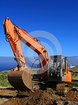 Bulldozer digging a whole