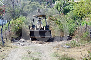 Bulldozer on dirt road