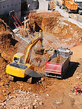 Bulldozer and dump truck