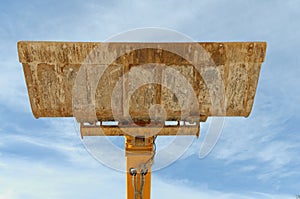 Bulldozer excavation scoop on sky background