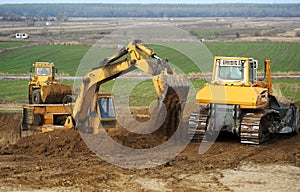 Bulldozer and excavator
