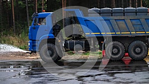 Bulldozer, excavator and dump truck operation