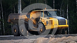 Bulldozer, excavator and dump truck operation