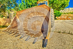 Bulldozer excavator on wheels