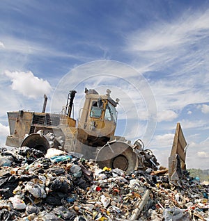 The bulldozer on a garbage dump