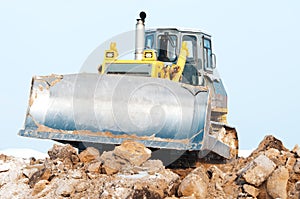 Bulldozer loader at winter frozen