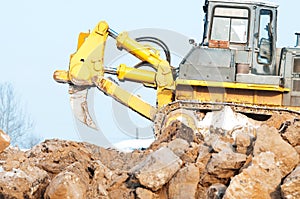 Bulldozer loader at winter frozen