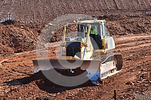 Bulldozer Moves Dirt During Interstate Highway Project in USA