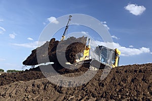 Bulldozer moving dirt