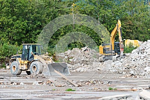 Bulldozer and pneumatic jackhammer digger