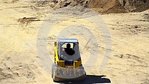 A bulldozer pushing dirt