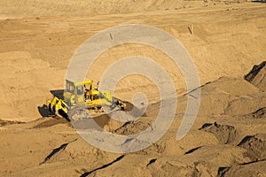 A bulldozer at a reservoir construction sit