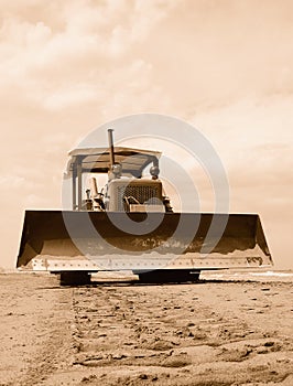 Bulldozer on the sand