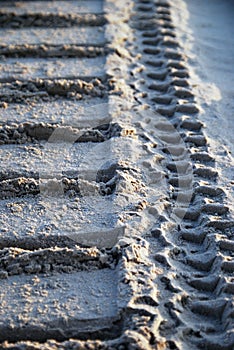 Bulldozer tracks in sand