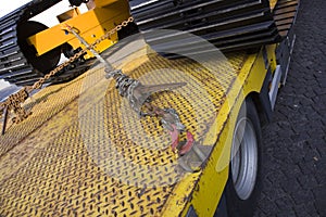 Bulldozer on truck