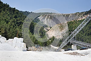 Bulldozer working at marble quarry