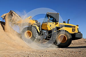 Bulldozer Working with Sand