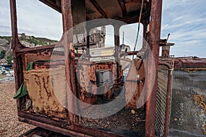 Bulldozers at Hastings fishing boats on the beach at Rock-a-Nore