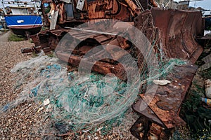 Bulldozers at Hastings fishing boats on the beach at Rock-a-Nore