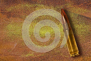 Bullet on grunge background