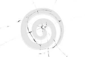 Bullet hole in glass close up on white background