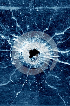 Bullet hole in glass window