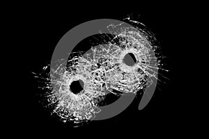 Bullet holes isolated on black