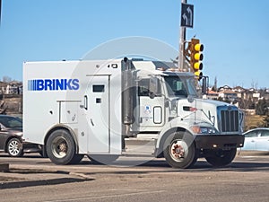 A bullet-resistant armored Brinks truck, a provider of security services to banks,