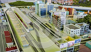 Bullet train in a city diorama.