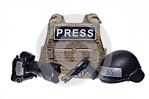 Bulletproof vest, camera, gun and helmet isolated