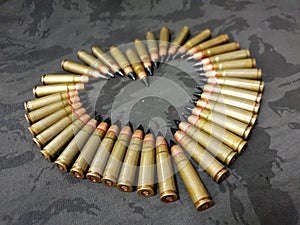 Bullets on the black camo  in the shape of a heart photo