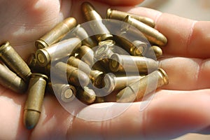 Bullets in hand