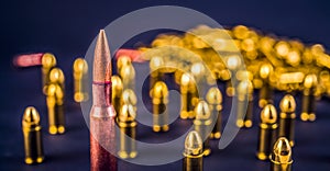 Bullets and handcuffs. Close-up of 9mm pistol. Gun and weapon with bullets amunition on black backround. Top view.