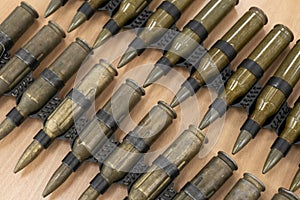 Bullets in a iron metal belt lined as a weapon, military concept