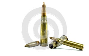 Bullets are laid on the floor with a white background.