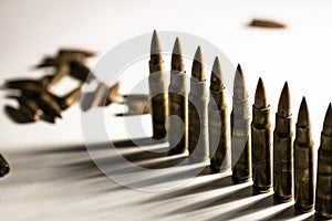 Bullets lined in a row. War, criminal, army, weapon concept