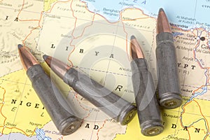 Bullets on the map of Libya photo