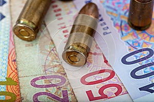 Bullets and money