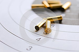 Bullets on paper target for shooting practice