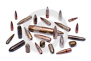 Bullets of various calibers on white background