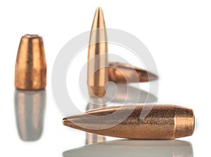 Bullets on white background with reflection