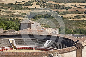 Bullring in Brihuega and Alcarria summer landscape. Guadalajara, Spain photo