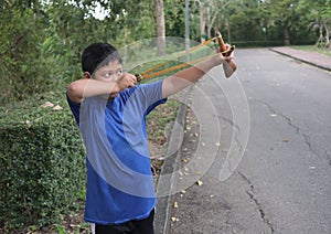 Bully boy aiming the target